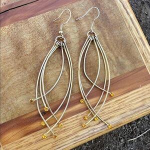 Vintage gold tone earrings with amber gemstones